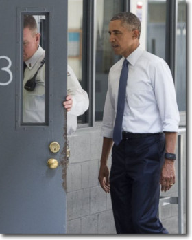 Obama enters prison door at El Reno in Oklahoma on July 16, 2015