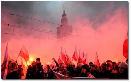 Nationalists march in Warsaw Poland Saturday Nov 11, 2017 while chanting 'Sieg Heil'
